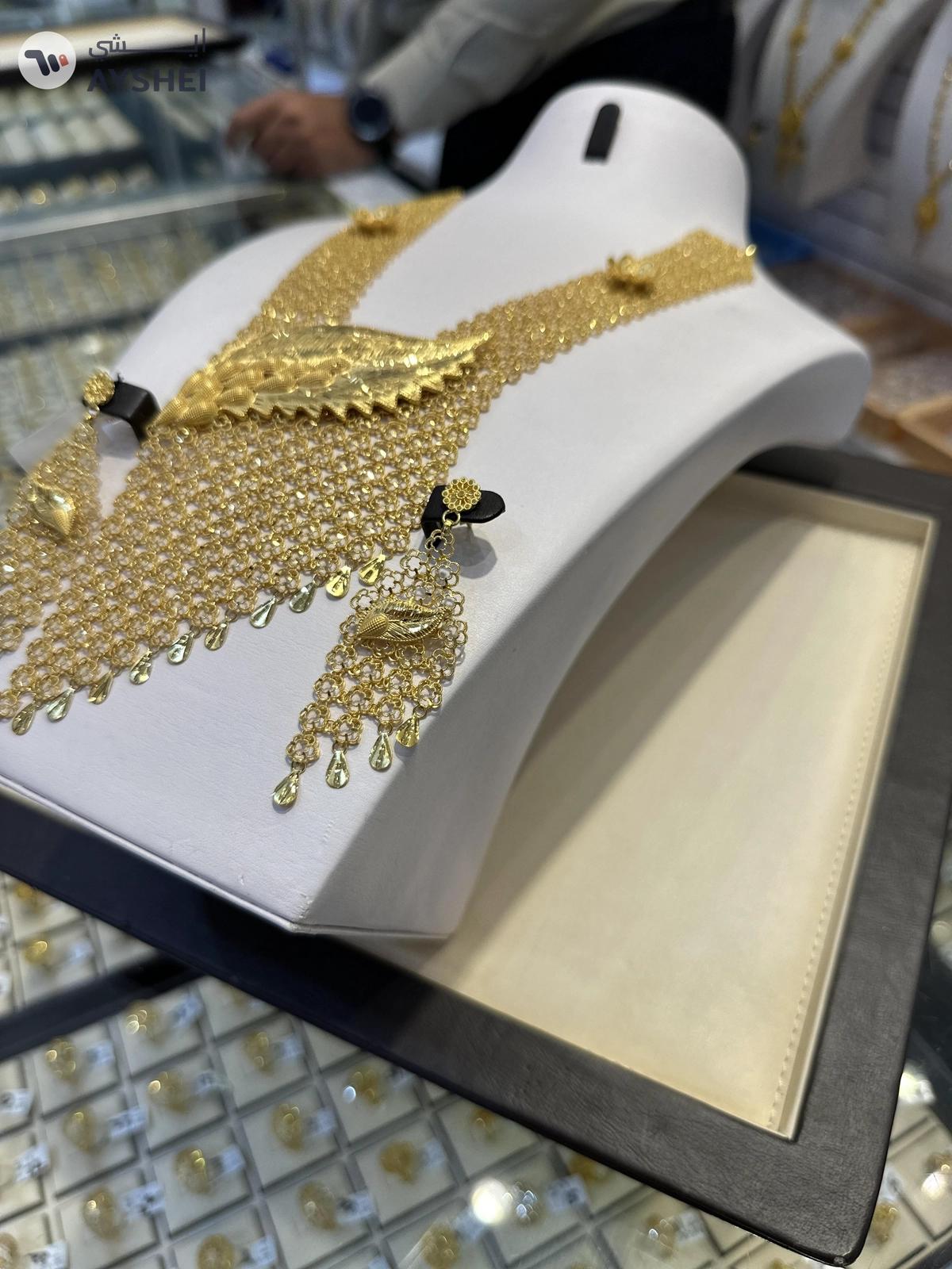 "Luxurious 22 Carat Gold Jewelry Set Item: Exquisite Gold Necklace and Earring Set Weight: 153.75 grams Making Charges: AED 5 per gram"-5-5