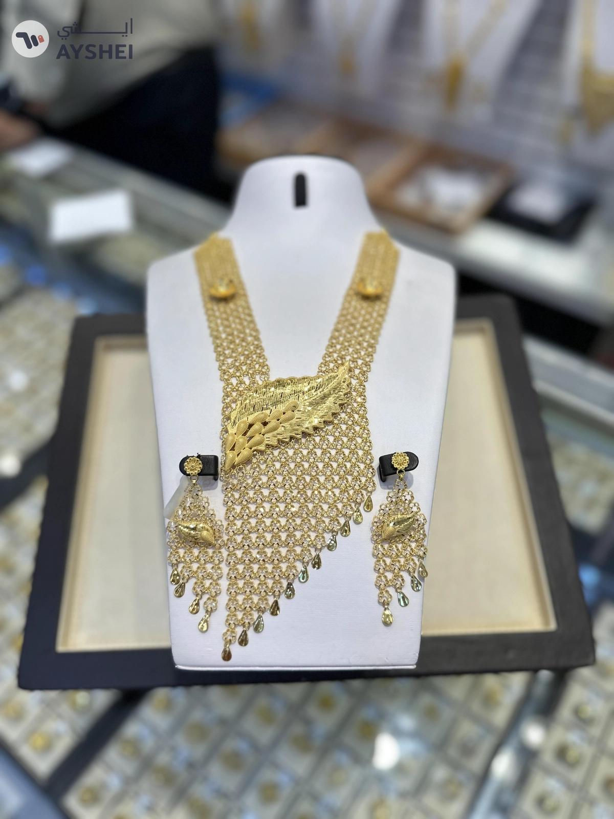 "Luxurious 22 Carat Gold Jewelry Set Item: Exquisite Gold Necklace and Earring Set Weight: 153.75 grams Making Charges: AED 5 per gram"-3-3