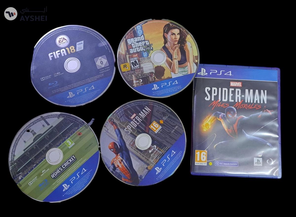 PS4 CONSOLE WITH CONTROLLERS AND CDS-2-2