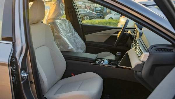 2025 Toyota Camry LE 2.5L Hybrid with Panoramic Sunroof (Grey)