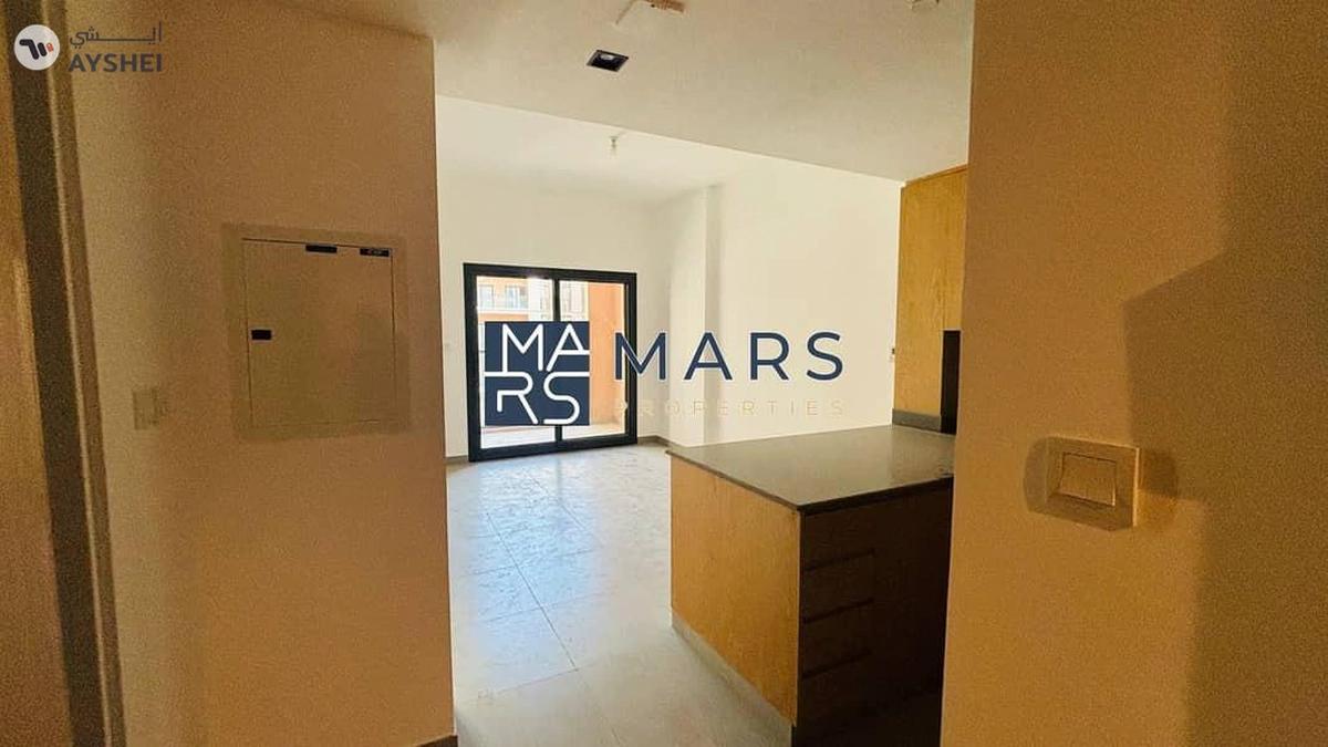 Cozy 1BHK with Balcony & Stunning Community View-1-landscape
