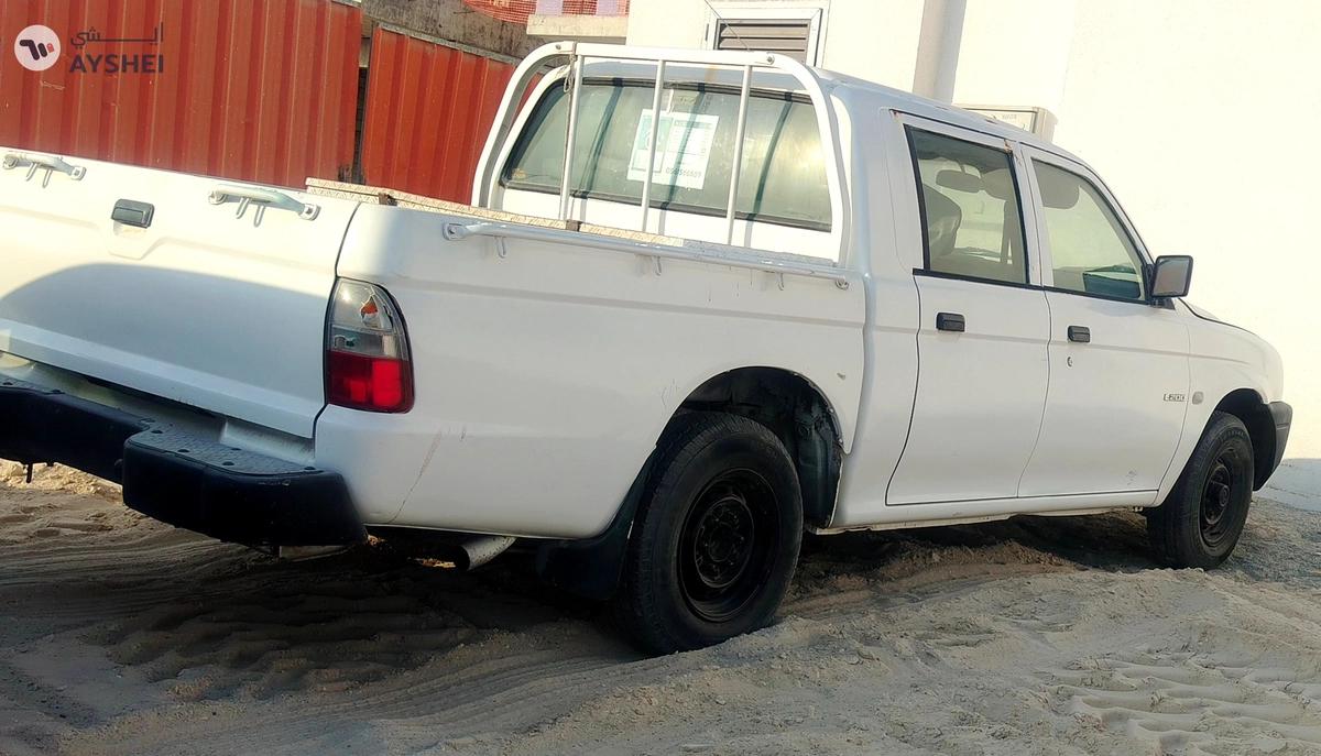 Mitsubishi L200 -6-6