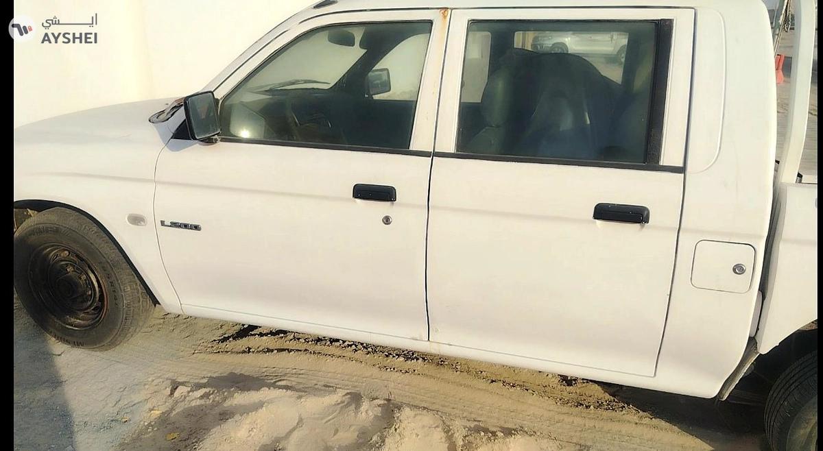 Mitsubishi L200 -4-4