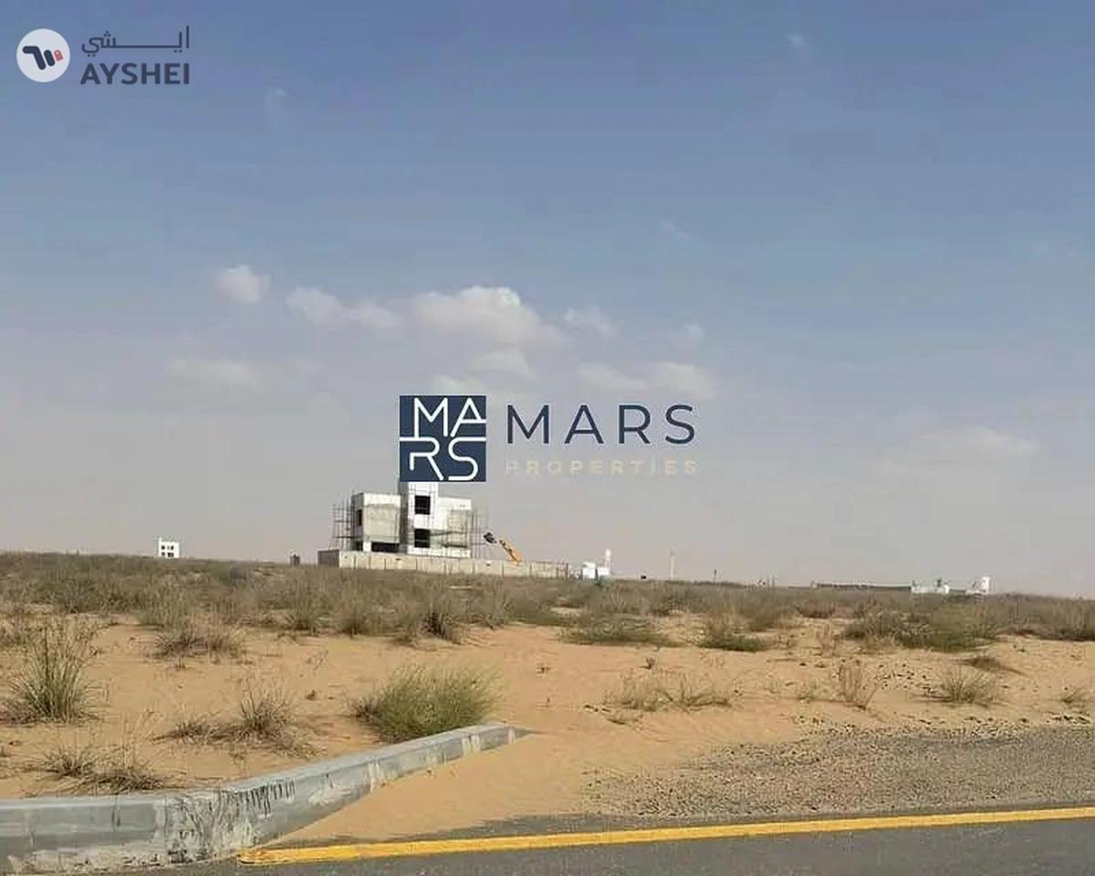 Land in Rawdat Al Qurt on a main road and alley – Prime Location-0-0