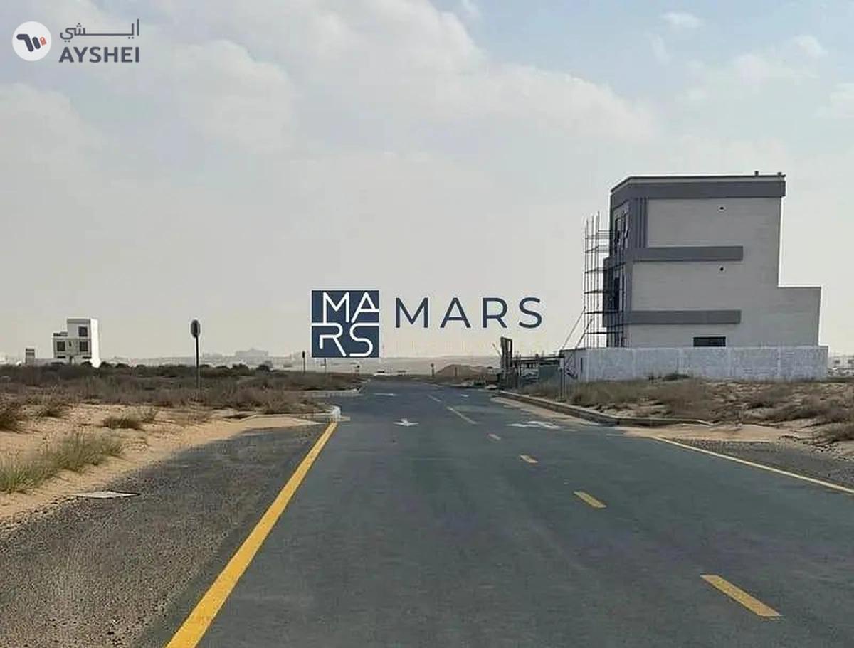 Land in Rawdat Al Qurt on a main road and alley – Prime Location-1-1