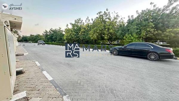 Perfectly located on Main Street residential plot 16000 sqft for sale in Al khazamia
