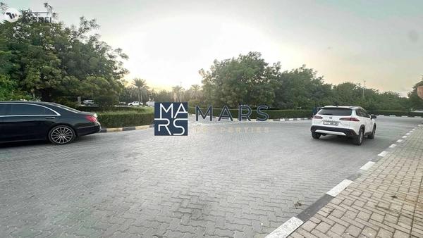 Perfectly located on Main Street residential plot 16000 sqft for sale in Al khazamia