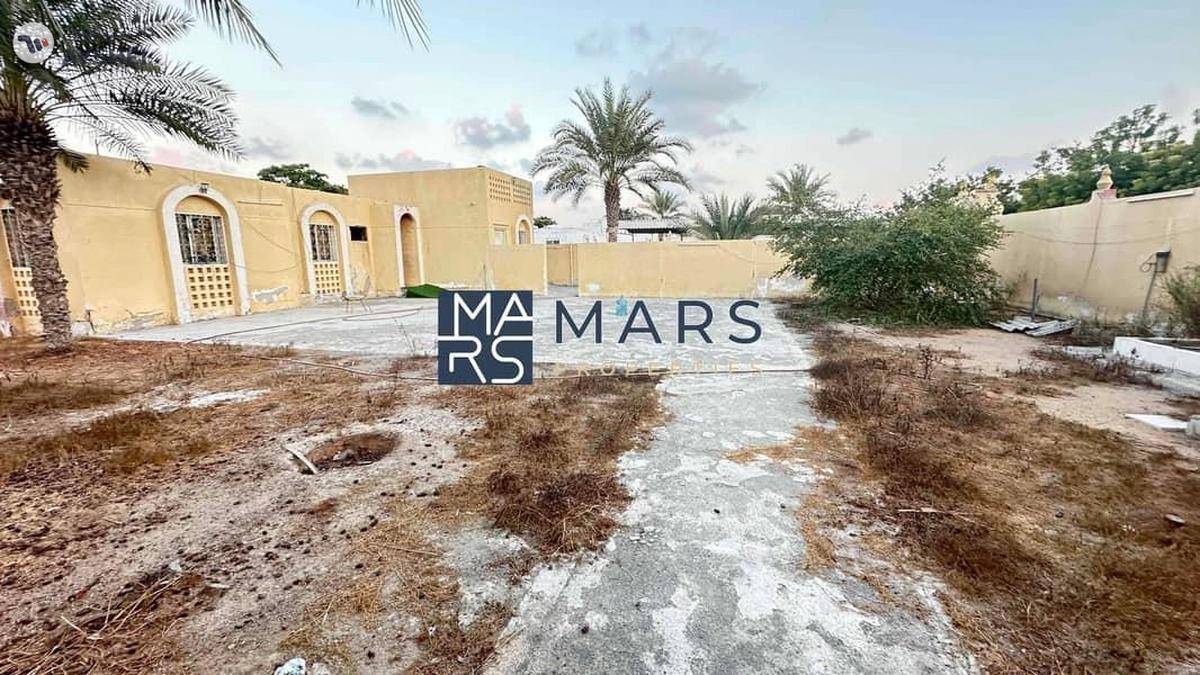 Perfectly located on Main Street residential plot 16000 sqft for sale in Al khazamia-4-4