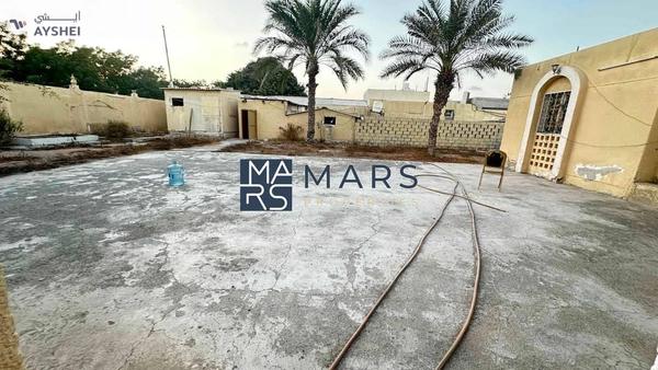 Perfectly located on Main Street residential plot 16000 sqft for sale in Al khazamia