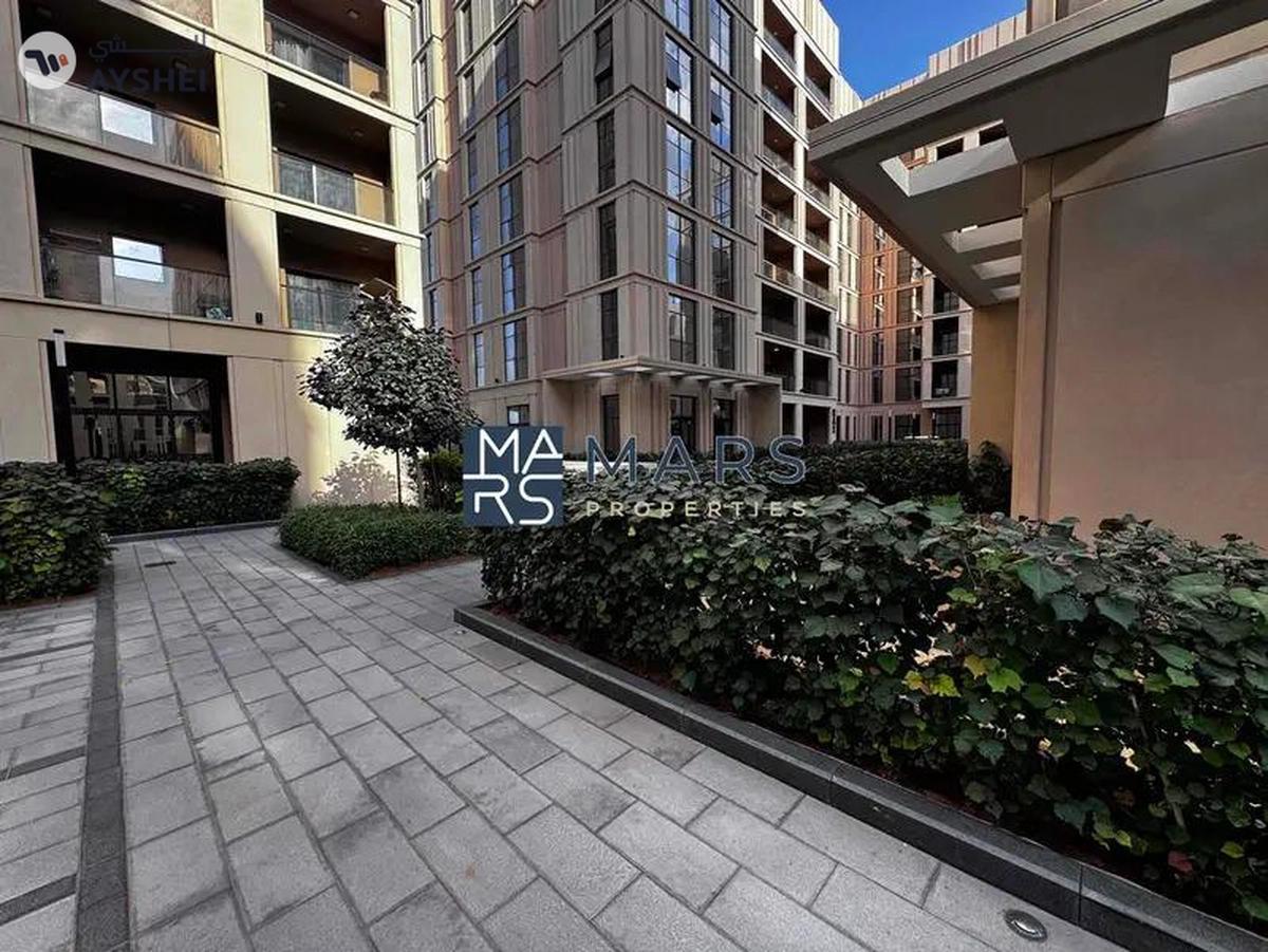 Spacious one bedroom with kitchen appliances in modern community-0-landscape