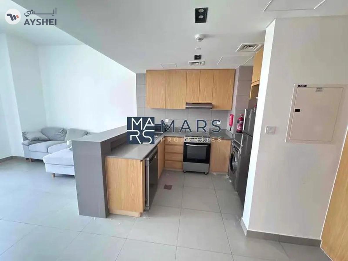 Spacious one bedroom with kitchen appliances in modern community-5-5