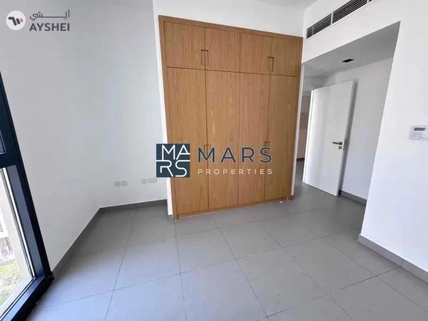 Spacious one bedroom with kitchen appliances in modern community