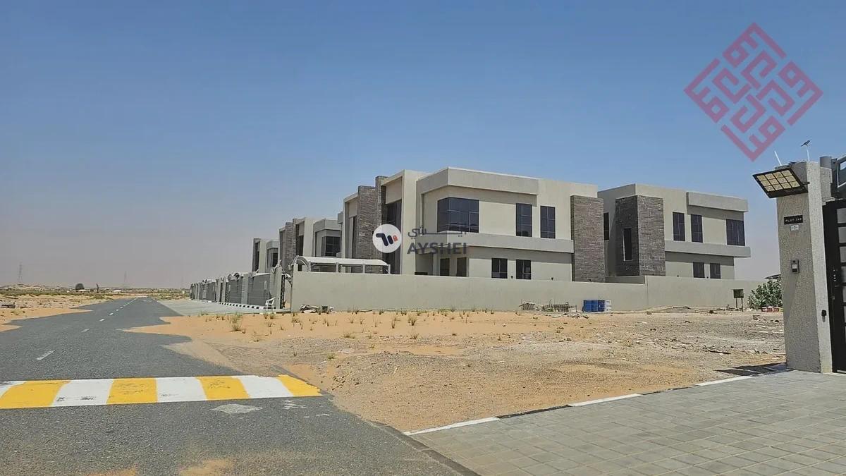 Residential investment plots (G+2) for sale directly next to Umm Al Quwain University on Sheikh Mohammed bin Zayed Road | free hold-0-landscape