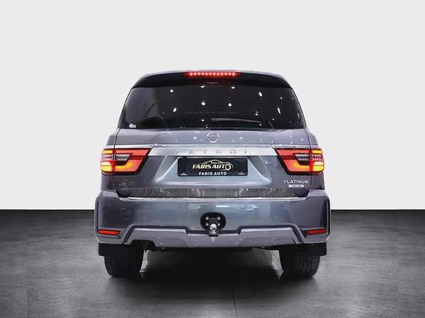 NISSAN PATROL V8 LE PLATINUM GCC FULLY LOADED + STARLIGHT + REAR ENTERTAINMENT + SIDE STEPS