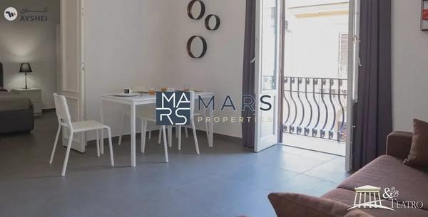 "Indulge in Luxury at Your Elegant Home: One-Bedroom Apartment in il teatro 1 Building, Sharjah"