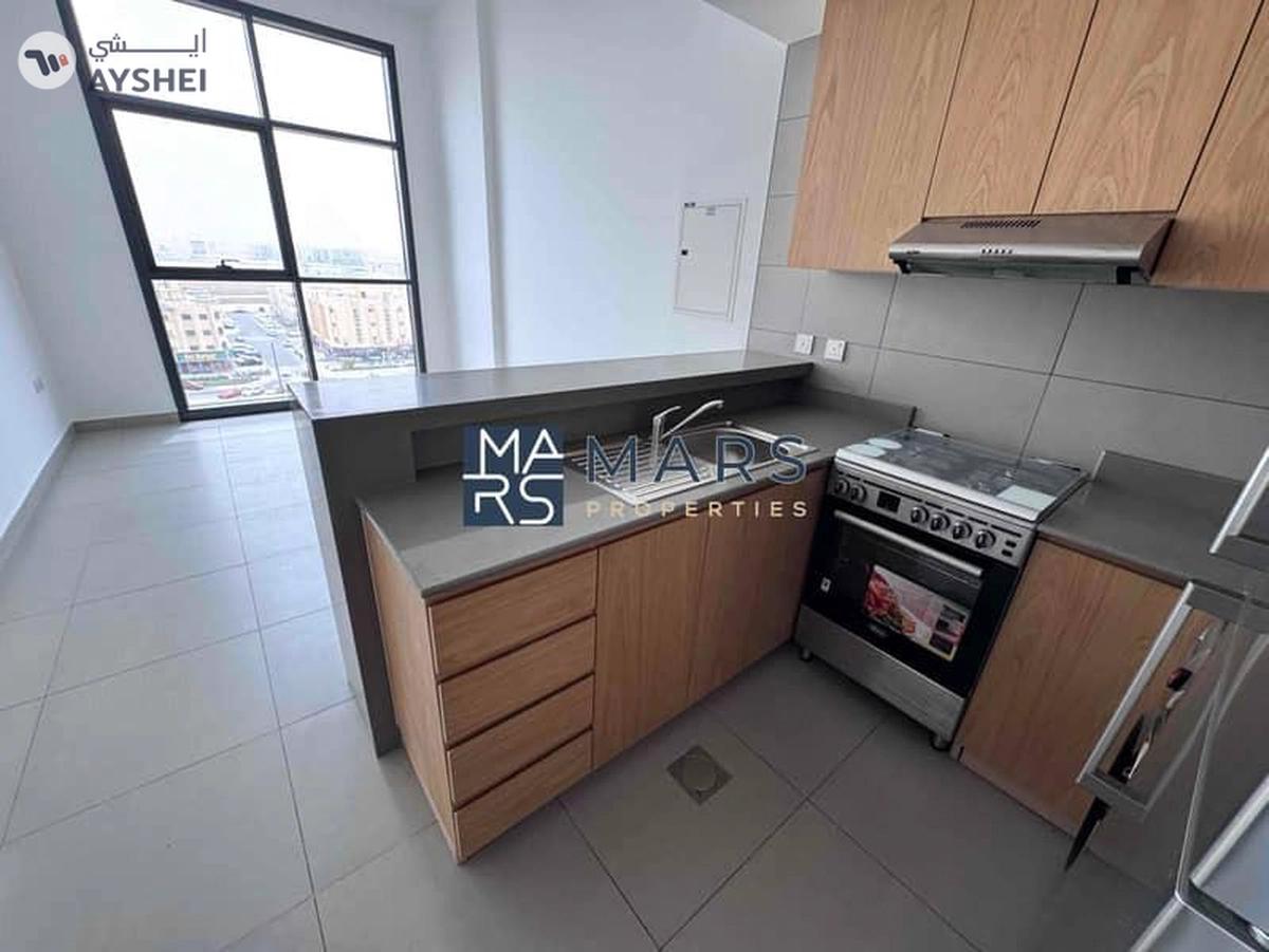 Spacious one bedroom with kitchen appliances and all facilities available for rent in Al Mamsha-1-landscape