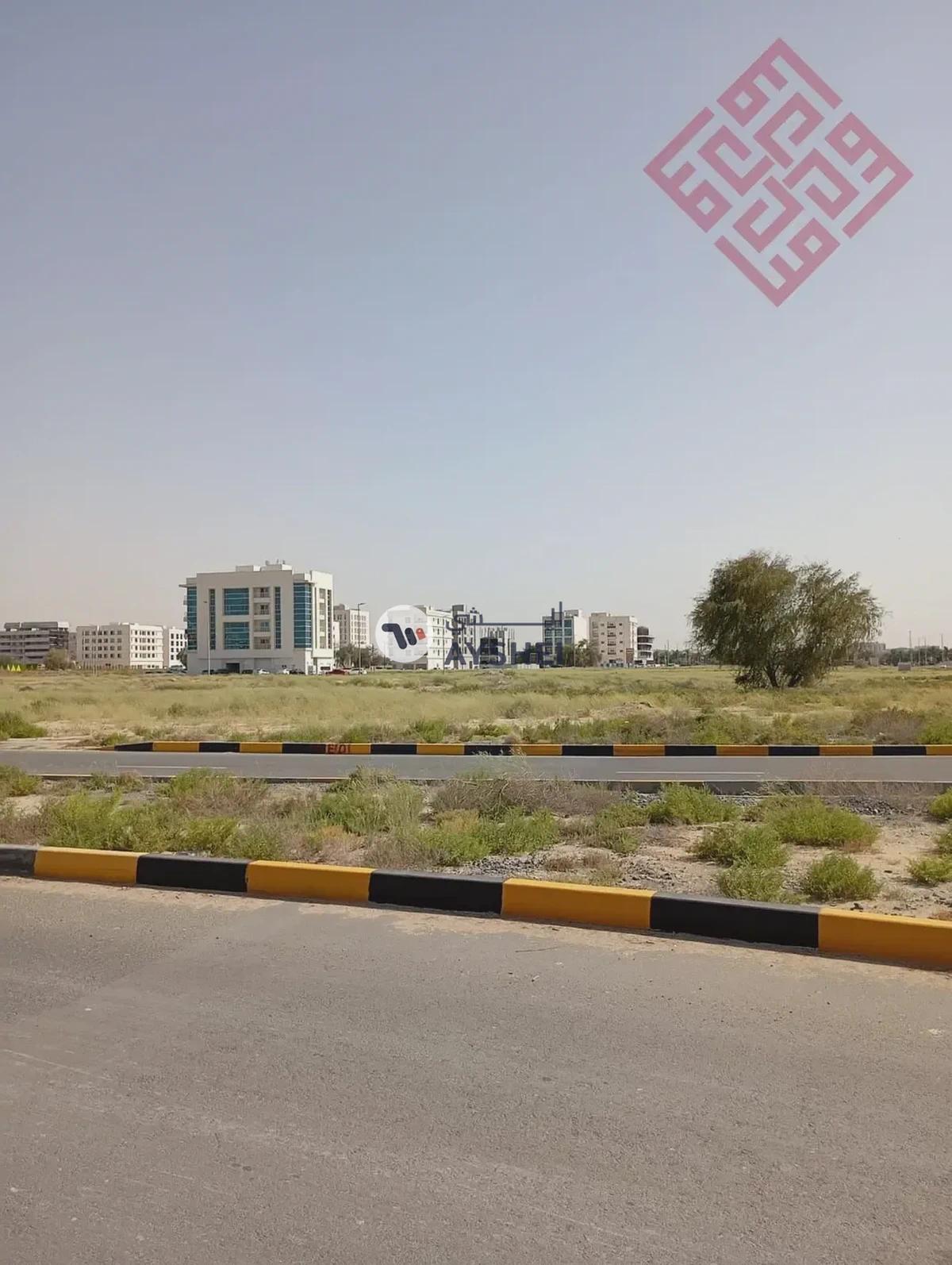 Commercial land for sale in Al-Houshi area in Sharjah with a good size and prime location - Best Price-1-1
