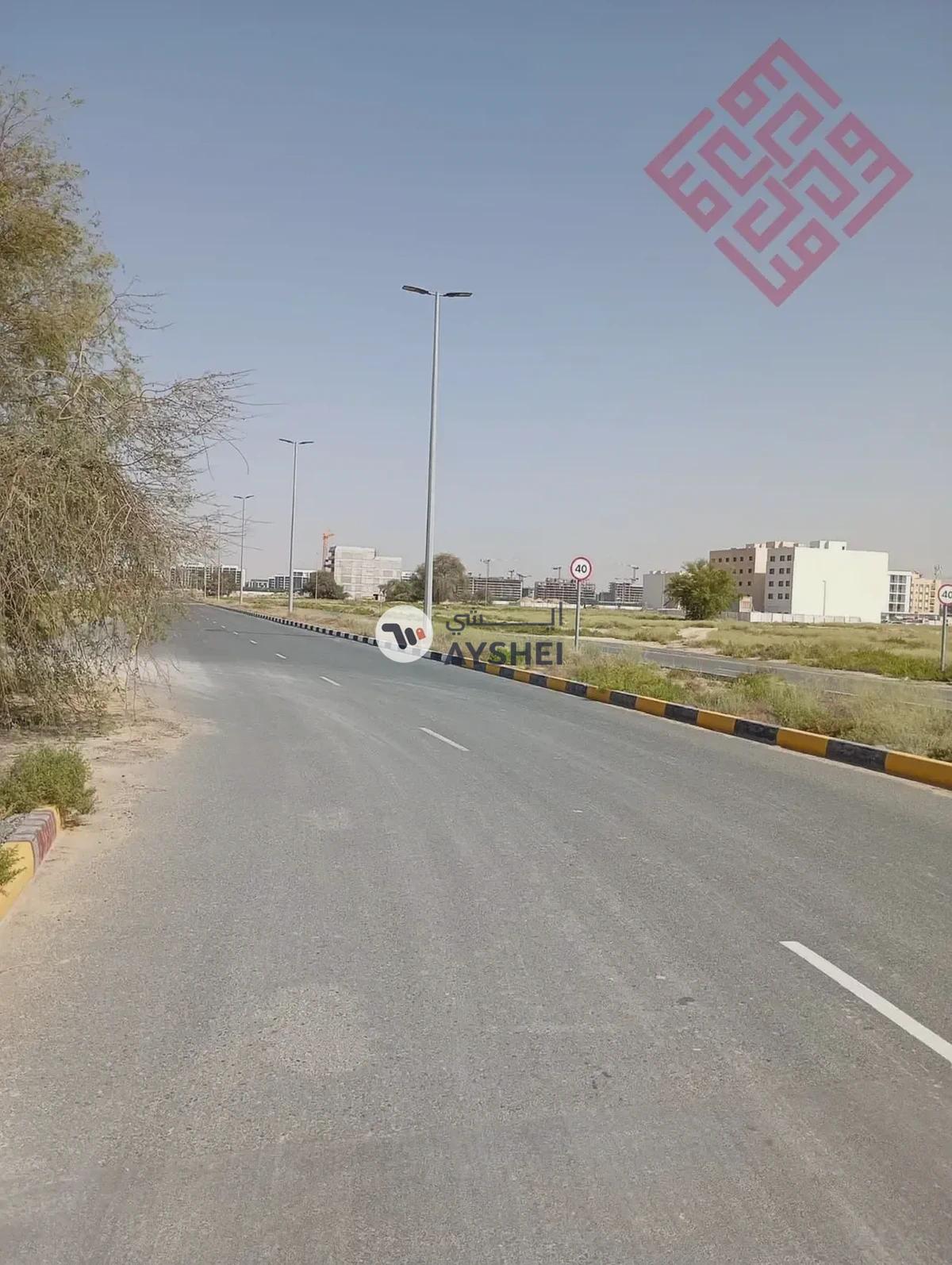 Commercial land for sale in Al-Houshi area in Sharjah with a good size and prime location - Best Price-4-4
