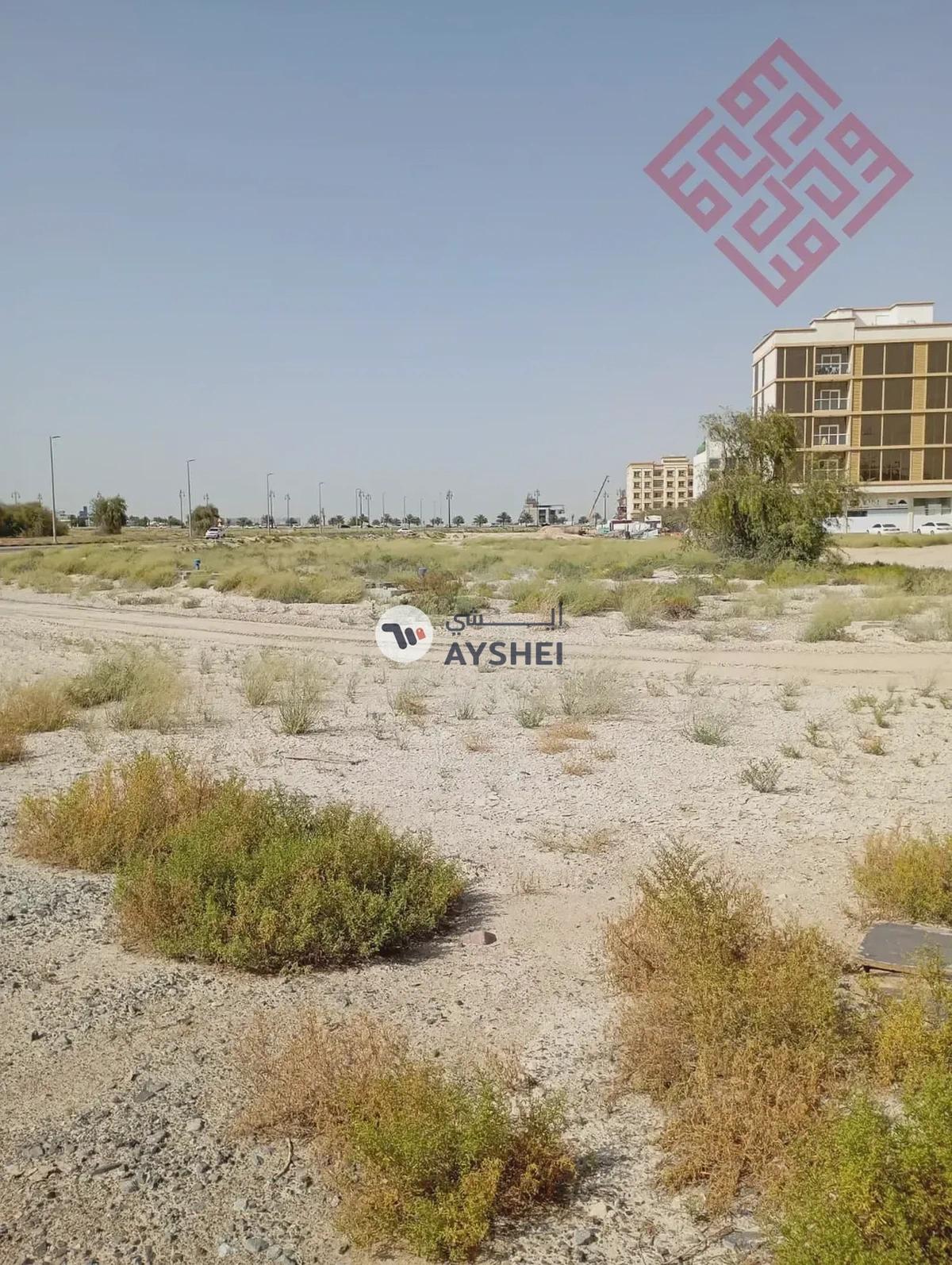Commercial land for sale in Al-Houshi area in Sharjah with a good size and prime location - Best Price-6-6