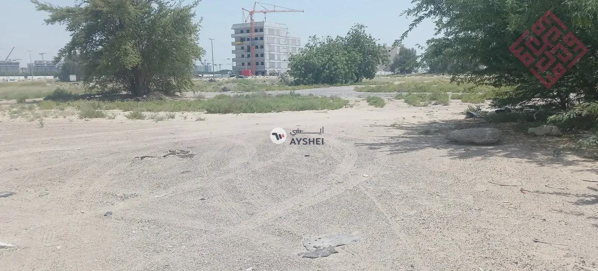 Commercial land for sale in Al-Houshi area in Sharjah with a good size and prime location - Best Price-8-8