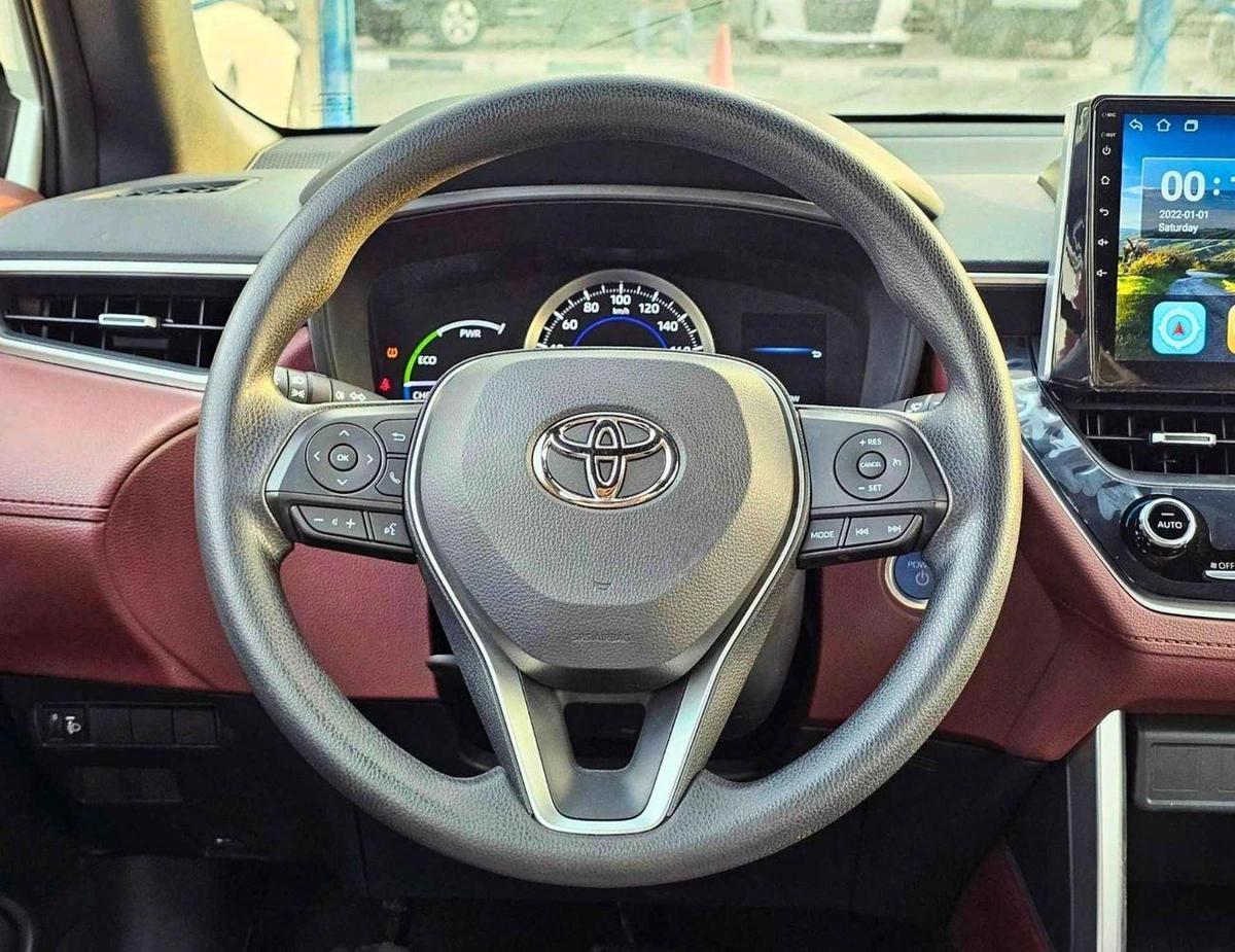 Toyota Corolla Cross HYBRID /1.8L PETROL A/T / FULL OPTION / SUNROOF, LEATHER/ 17" ALLOY WHEELS/CODE#XLE-12-12
