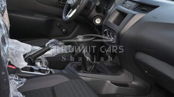 Nissan Navara NISSAN NAVARA 2.5 PETROL XE 4X2 MT SC PLUS