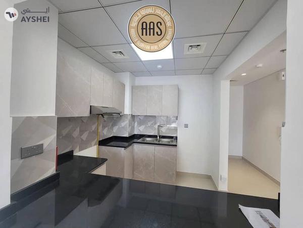 First tenant/ brand new 2bhk apartment with balcony & fitted cabinet in 105k AED