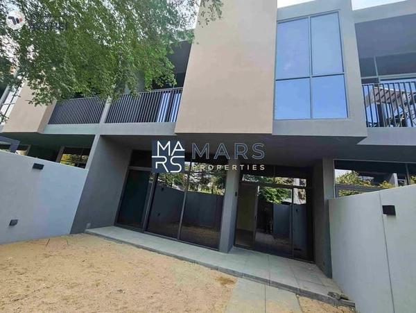 "Stunning 4-Bedroom Middle Unit Townhouse in Masaar – For rent