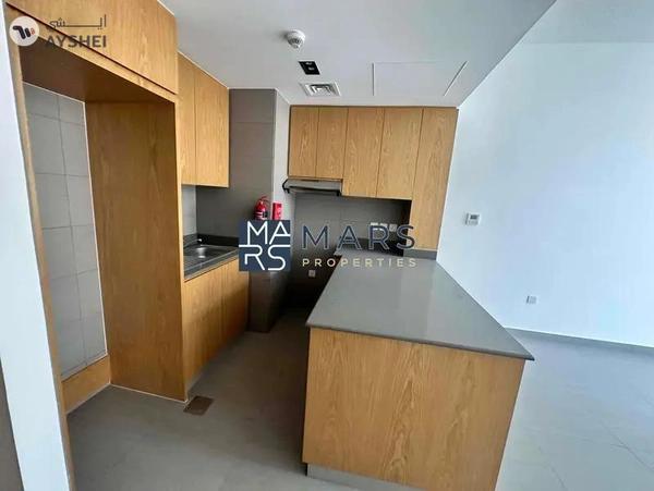 Specious one bedroom with pool view in al mamsha