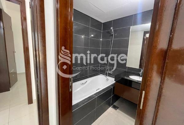 Spacious 1BR APT | Partial Sea View | Prime Area