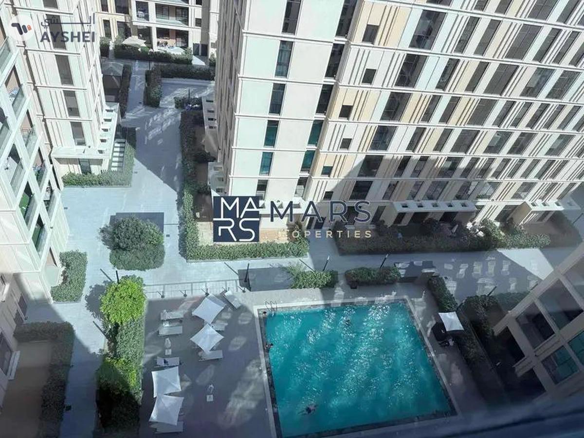 Poolside Luxury: 2BR Apartment with Scenic Views-0-landscape