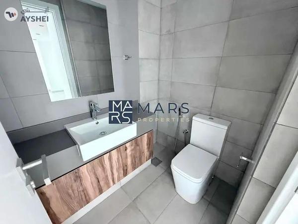 Poolside Luxury: 2BR Apartment with Scenic Views