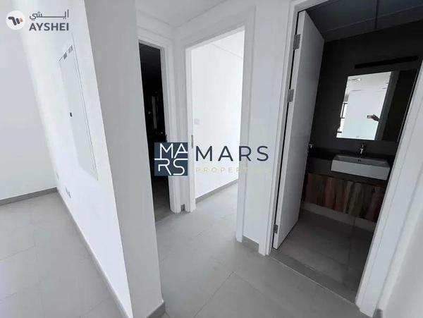 Poolside Luxury: 2BR Apartment with Scenic Views